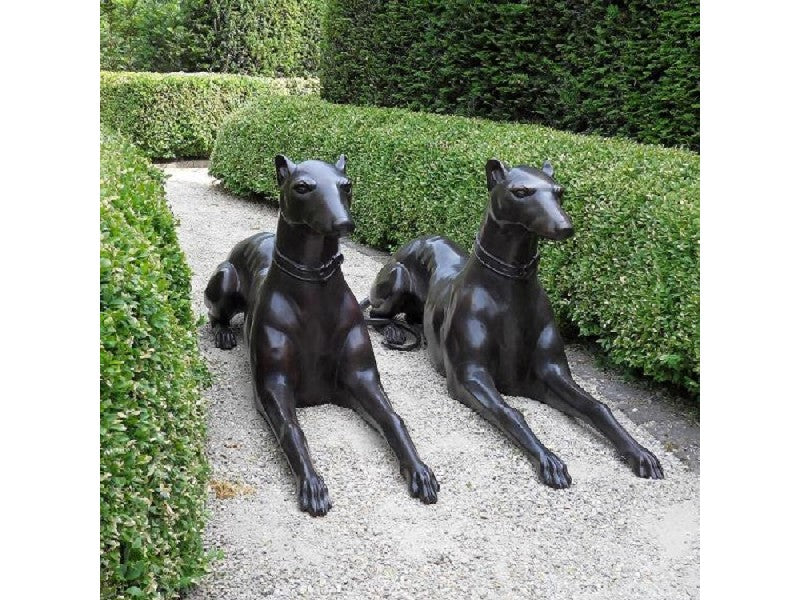 Pair Of Laying Dogs