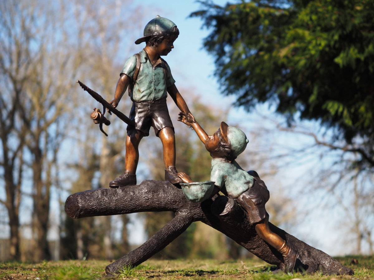 Fishing boys on a log