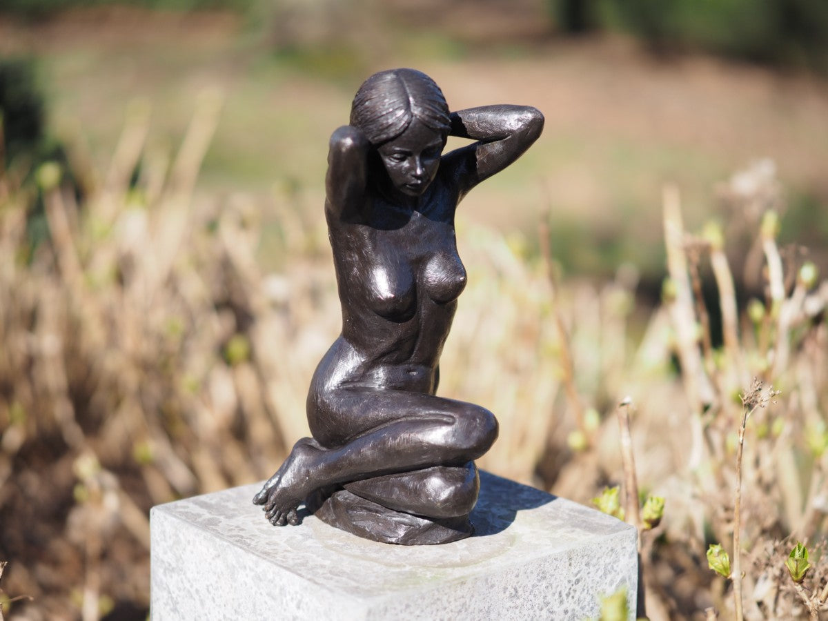 Sitting nude