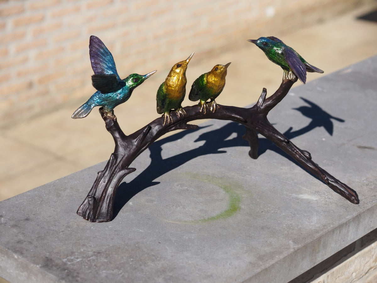 4 birds on a branch