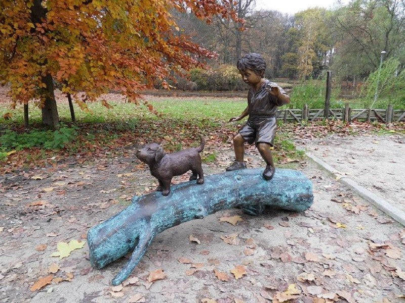 Boy With Dog On Trunk