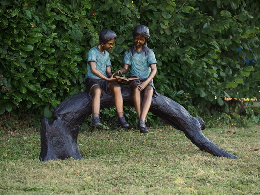 Boy And Girl On Log