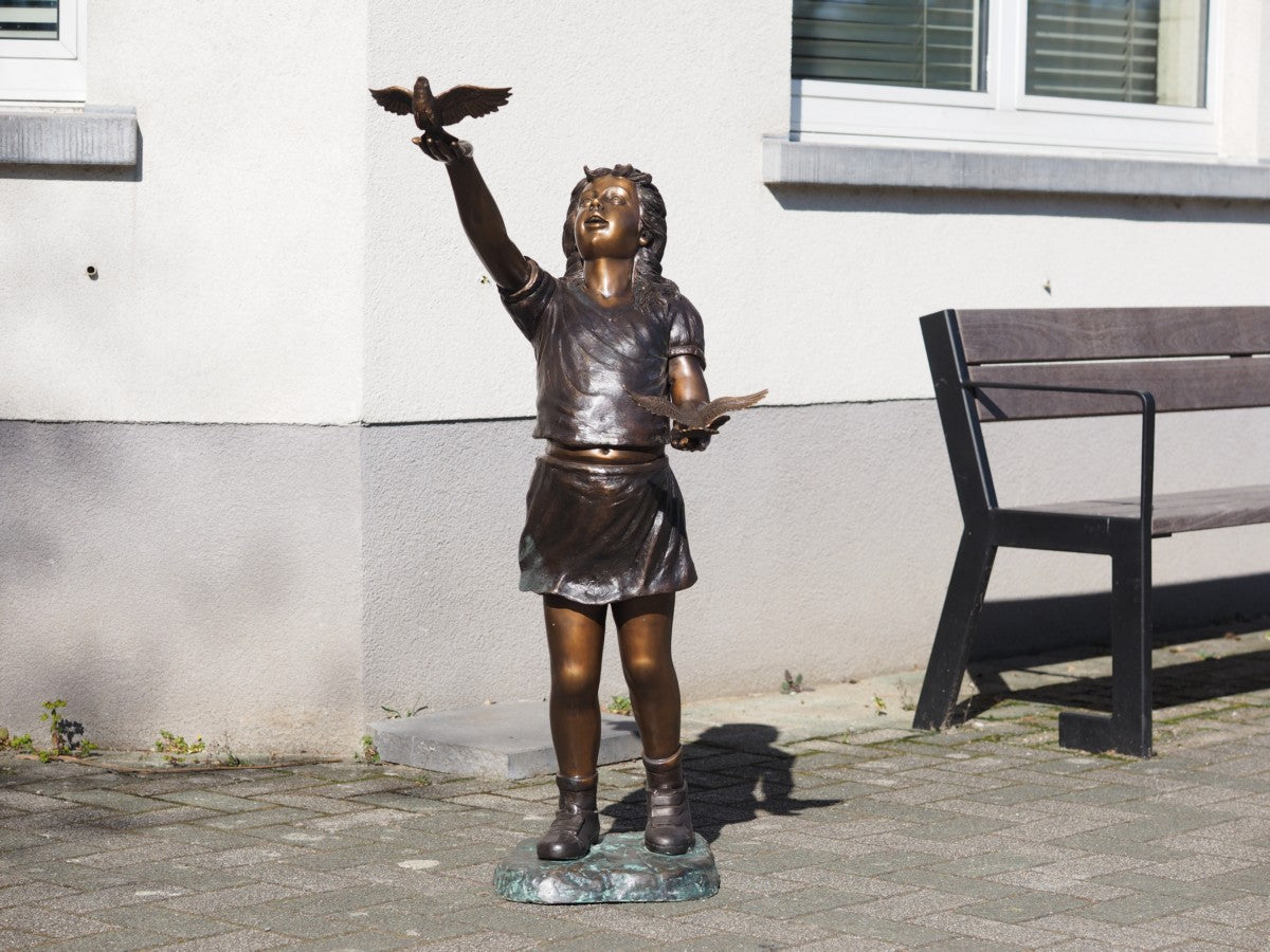 Girl with 2 little birds