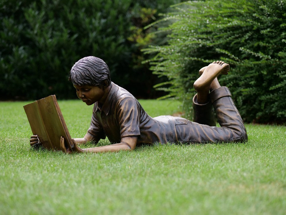 Laying Boy Reading