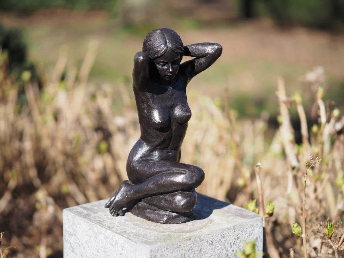 Sitting nude