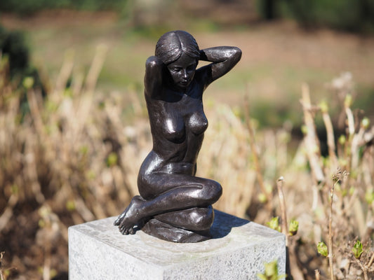 Sitting nude