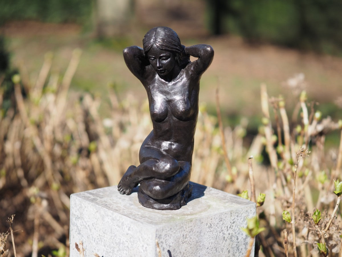 Sitting nude