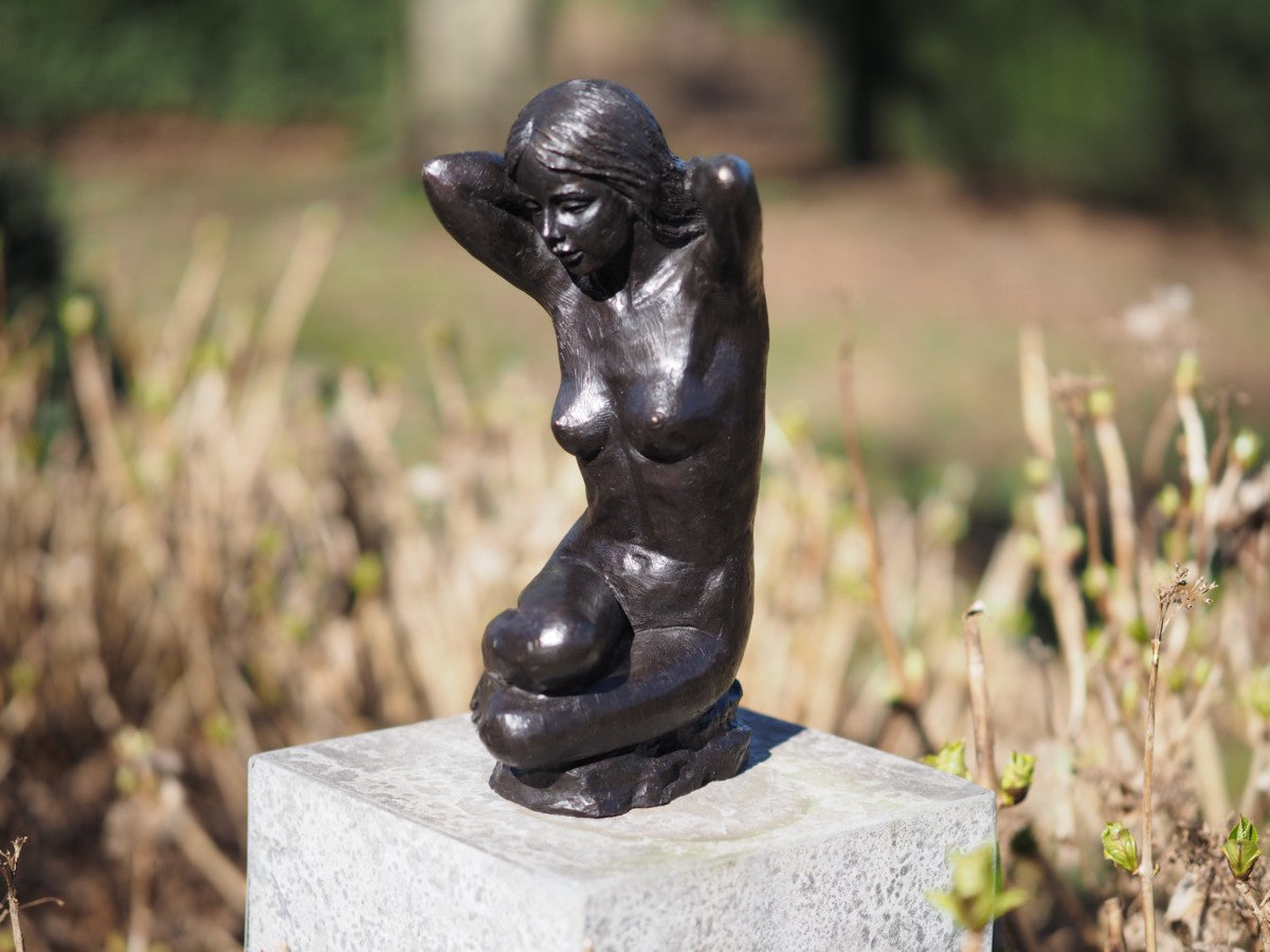 Sitting nude