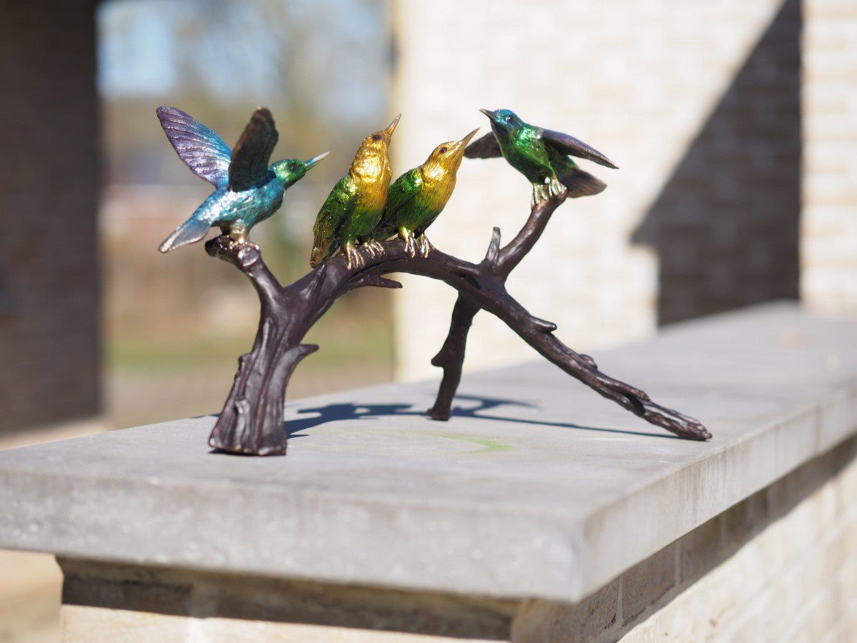4 birds on a branch