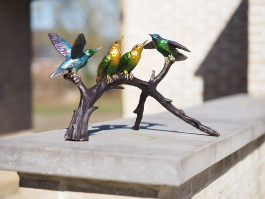4 birds on a branch