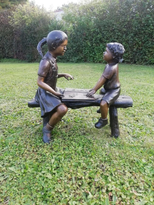 Boy And Girl On Bench