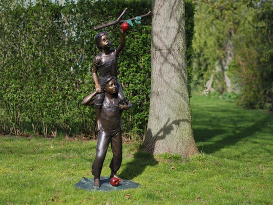 Boy And Girl Picking Apple