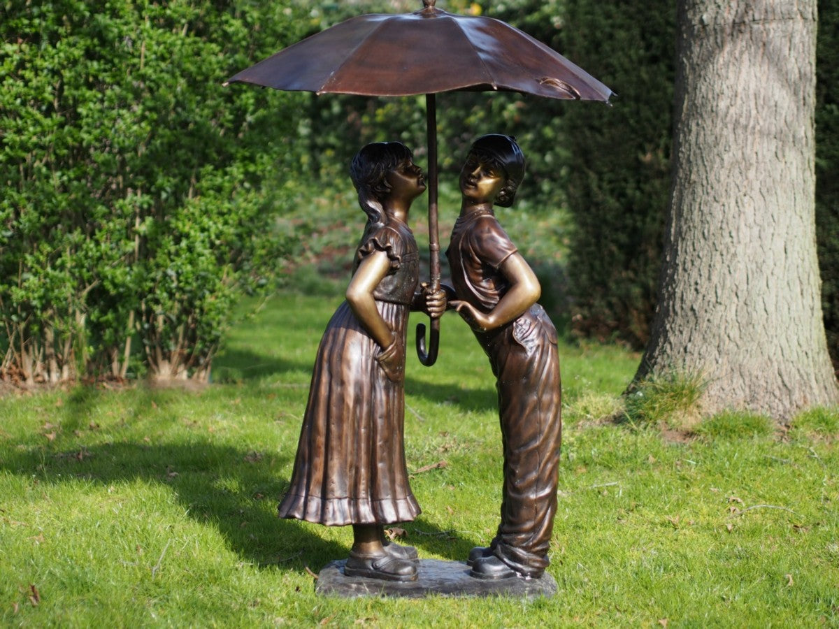 Boy And Girl Under Umbrella